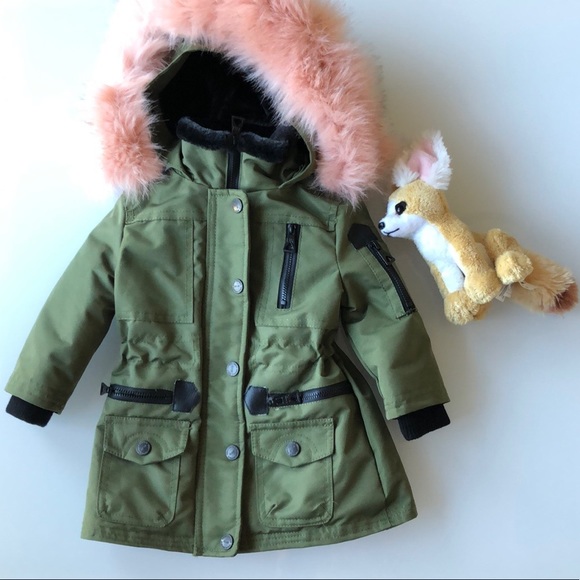 green jacket with fur hood